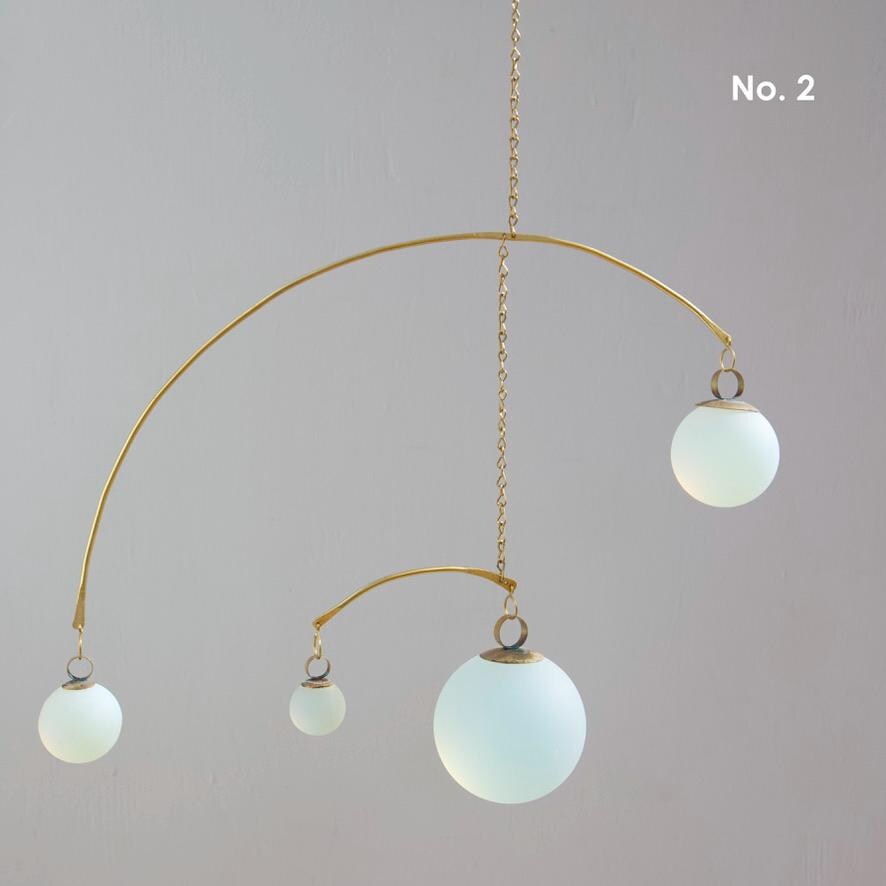 Opalite & Brass Kinetic Quattro Mobile