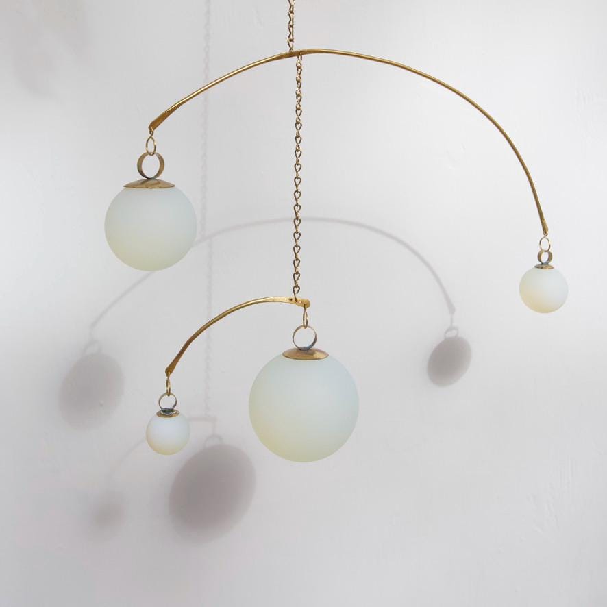 Opalite & Brass Kinetic Quattro Mobile