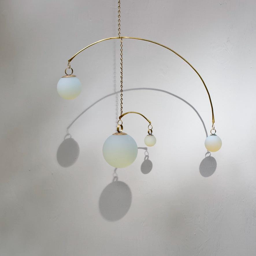 Opalite & Brass Kinetic Quattro Mobile