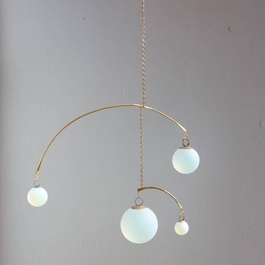 Opalite & Brass Kinetic Quattro Mobile