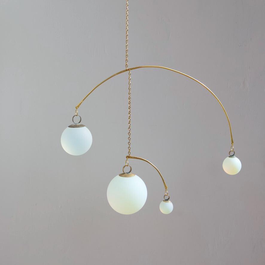 Opalite & Brass Kinetic Quattro Mobile