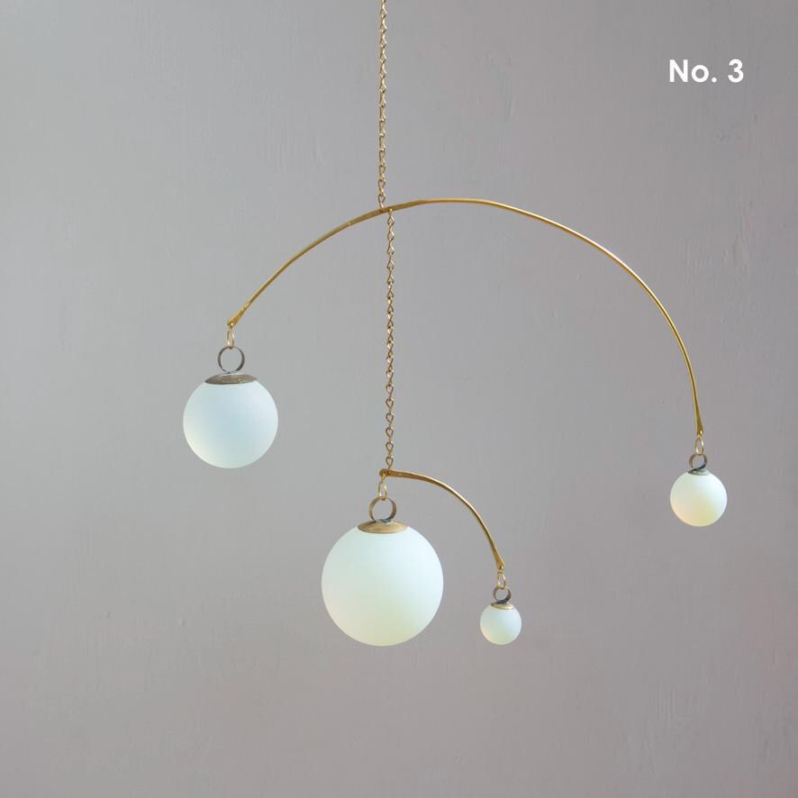 Opalite & Brass Kinetic Quattro Mobile
