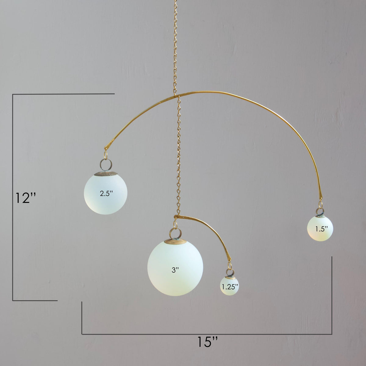 Opalite & Brass Kinetic Quattro Mobile